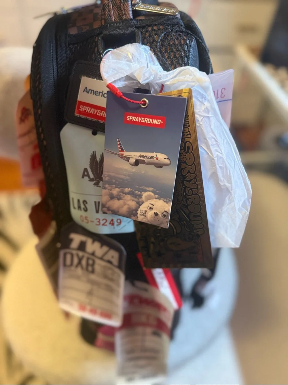Sprayground AMERICAN AIRLINES 100 YRS - TAGS ON TAGS BACKPACK